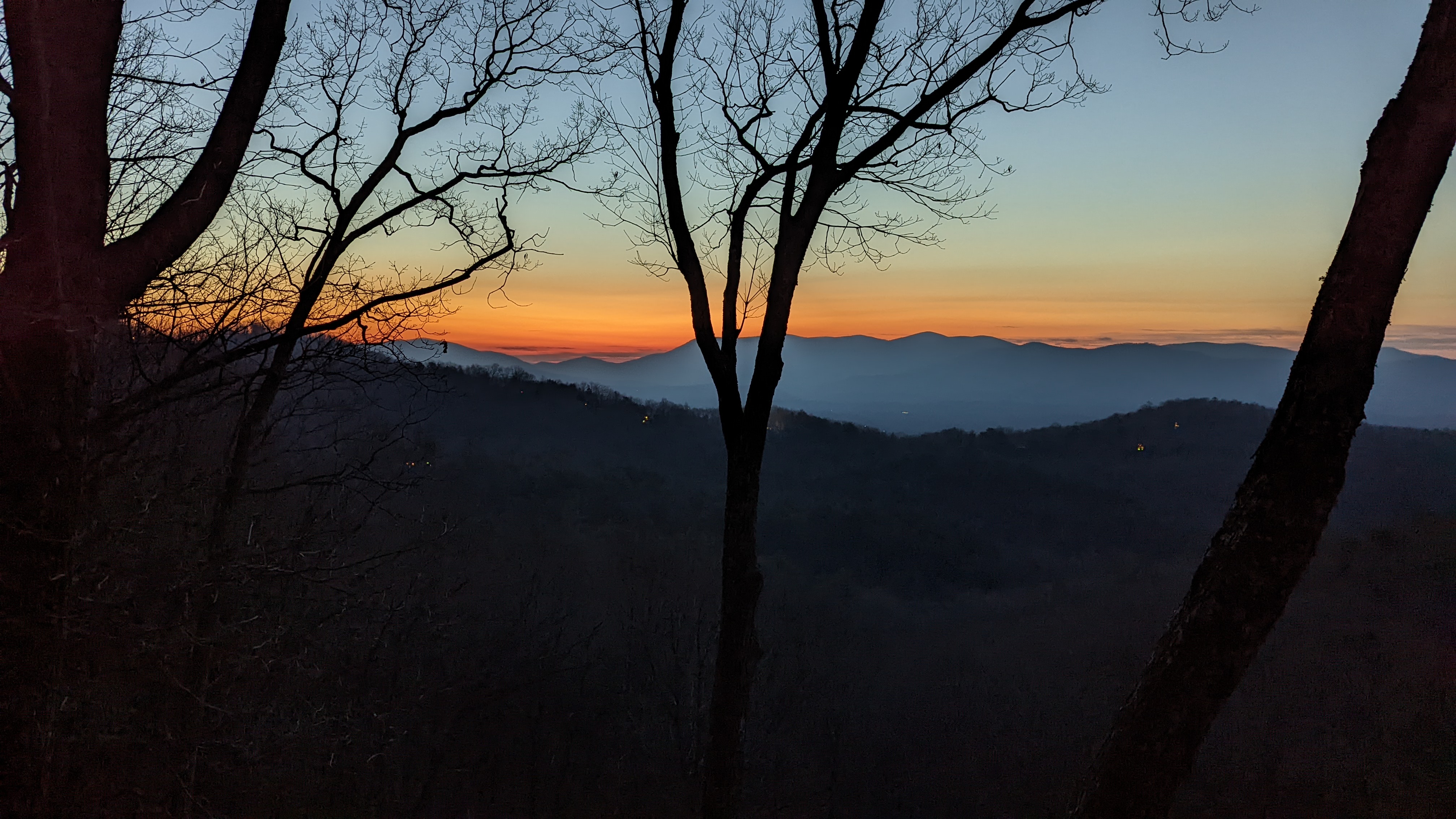 A second winter morning view with soft light and quiet ridges.